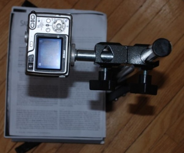 Try This: FotoNote is the premier iPhone solution for converting an image to electronic text