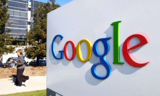 Google net income down as it sets aside $500M for advertising probe