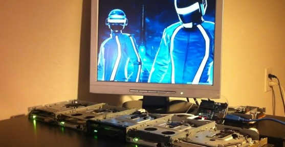 5 floppy disk drives drop a 120bpm break beat with Daft Punk’s Derezzed