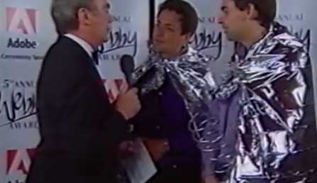 Watch Larry Page and Sergey Brin accept a Webby Award in 2000, wearing silver capes