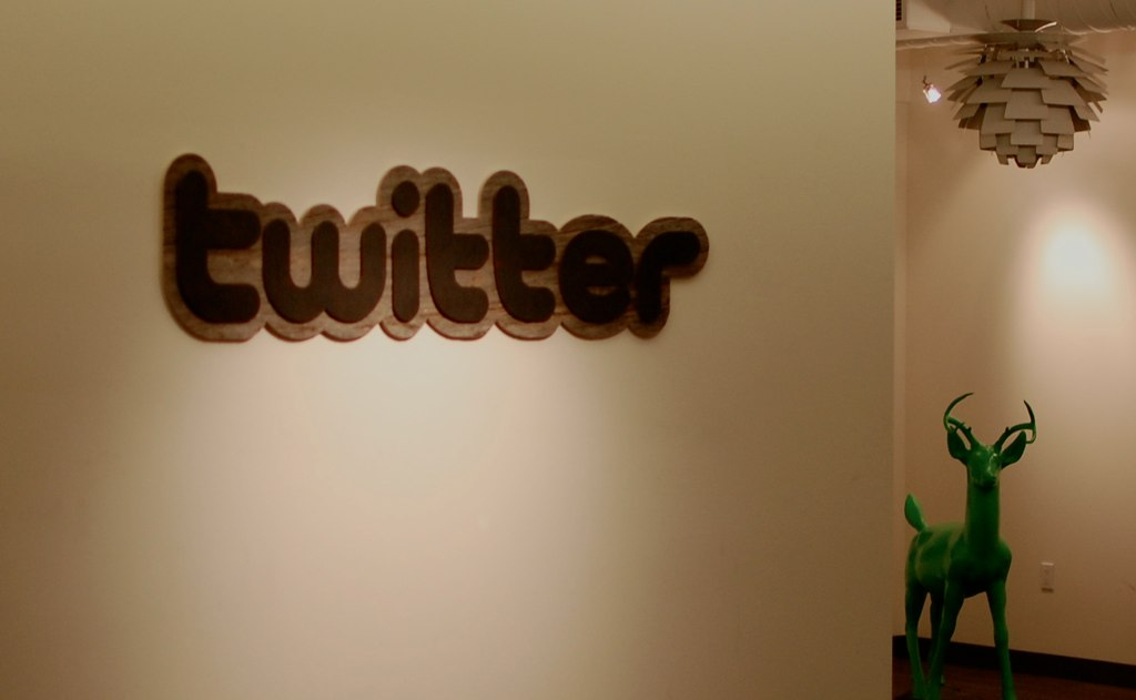 Twitter set for visibility boost as hashtag and username links now appear in Facebook status updates