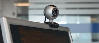 This photo shows a webcam on top of a co