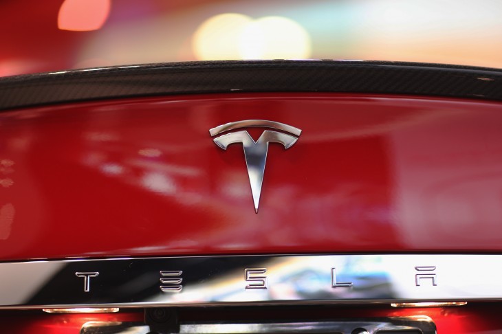 Tesla is ‘anxious’ to get distribution in China as it plans for a network of car charging ...