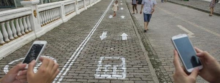 This Chinese city has special walking lanes for pedestrians who can’t put their phones down
