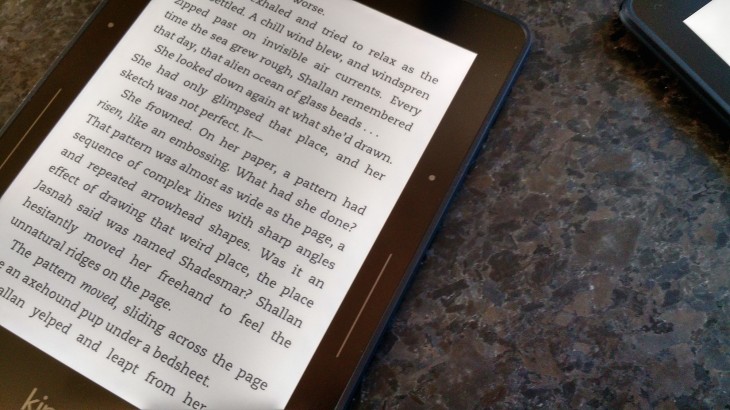 kindle voyage page turner 730x410 Amazon unveils the $    199 Kindle Voyage, a premium e reader with haptic page turning