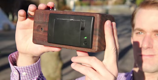 This instant camera will print images on a receipt paper roll