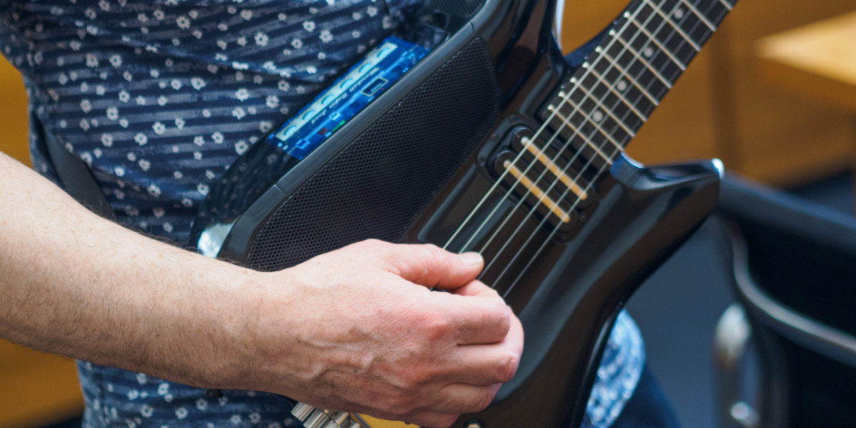 The iPhone-powered Fusion Guitar lets you mix and jam anywhere with a built-in amp