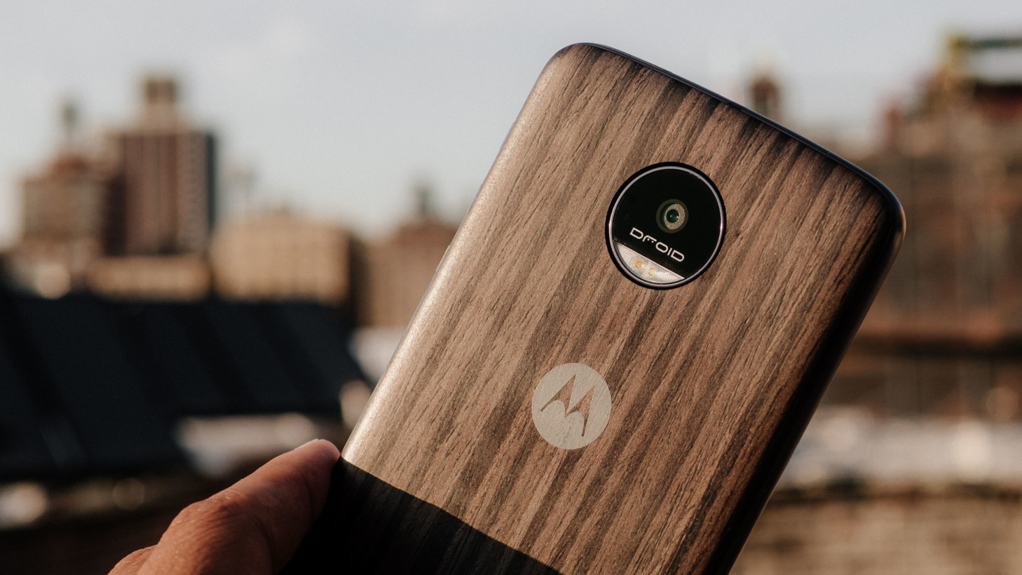 The Moto Z is packaged with a Style Mod, at least on Verizon, so you don't have to see the 'real'back unless you want to. Notice the camera is now flush with the body.