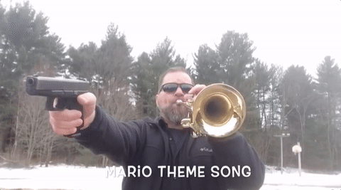 This guy performing the Mario theme with a gun and trumpet is perfectly normal